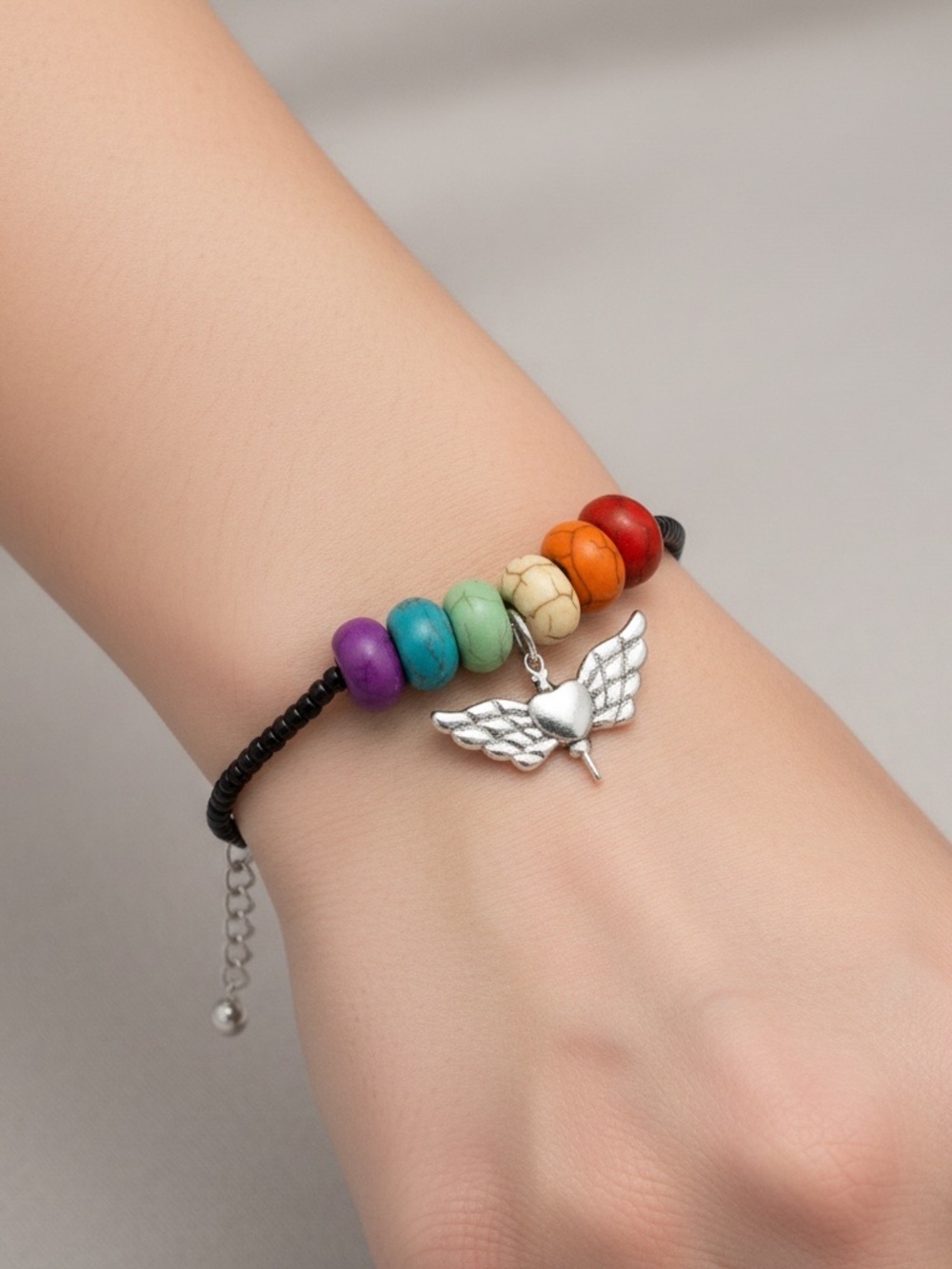 Rainbow Bead Bracelet with Silver Winged Heart Charm by Patience’s Jewelry Box